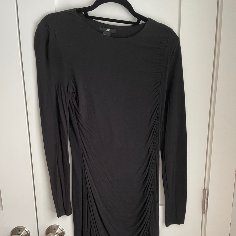 long sleeved ruched body con dress